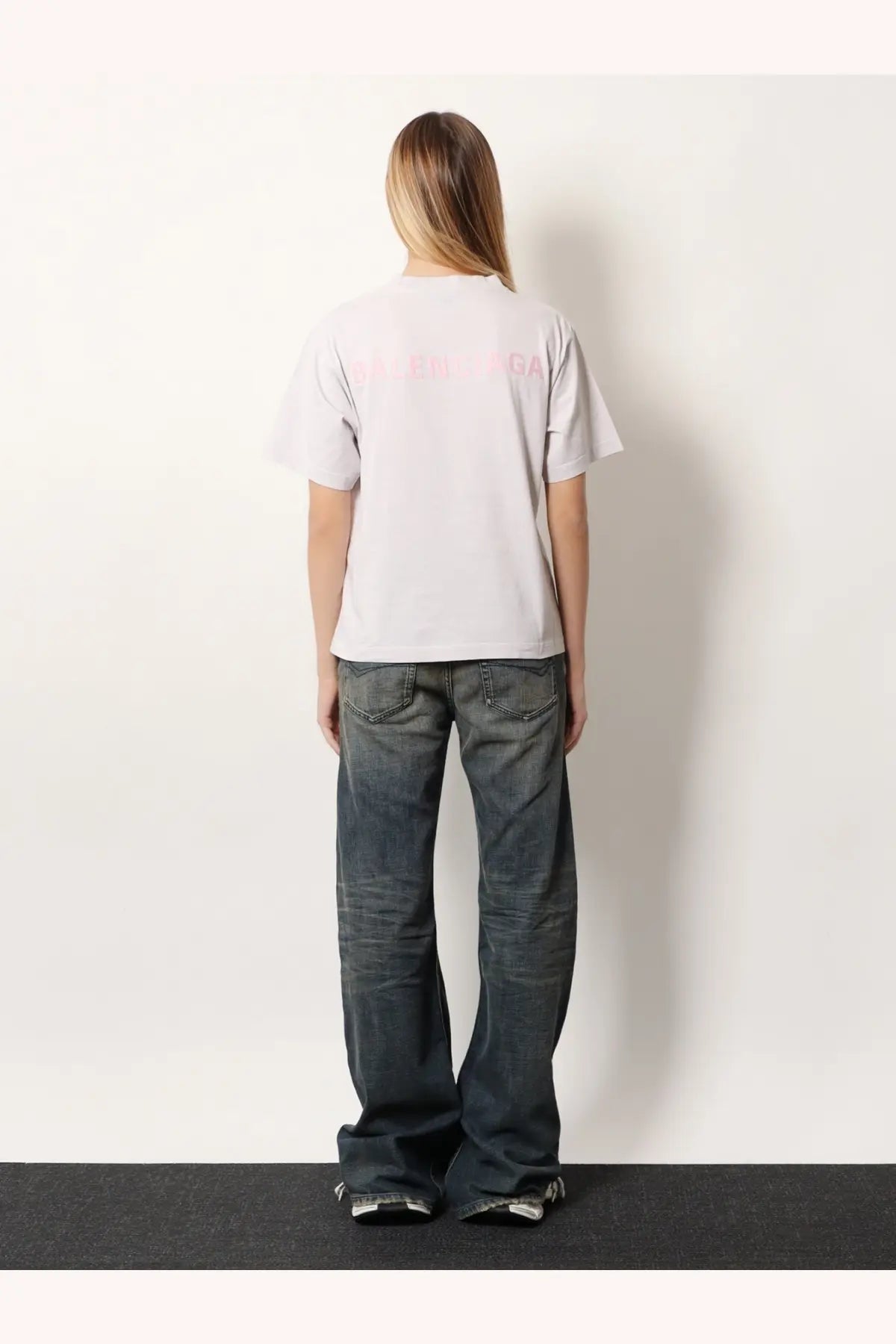Balenciaga womens white cotton shirt with a pale pink logo printed on the front short sleeved t-shirt