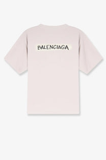 Balenciaga women’s cotton shirt white showing back with pale pink fabric and bold black logo print