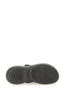 Balenciaga women’s crocs jibbitz sabot black featuring black rubber sole with textured tread pattern and molded branding