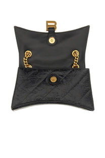 Balenciaga women’s crush small black quilted leather crossbody bag with gold-tone hardware and b logo clasp