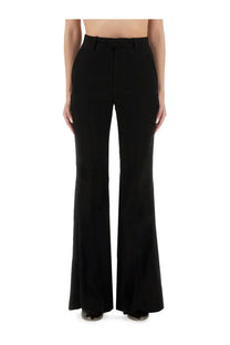 Balenciaga women’s black high-waisted flared pants with a sleek tailored fit perfect for stylish occasions