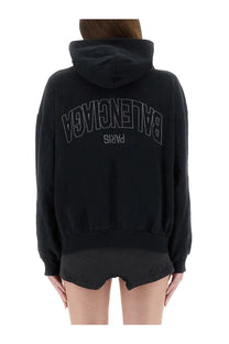 Balenciaga women’s flipped zippered sweatshirt black with black hoodie and silver thread arched balenciaga paris logo