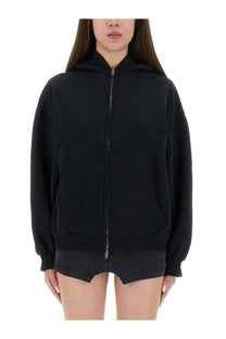 Balenciaga women’s black zip-up hoodie with relaxed fit and front pockets perfect for casual wear