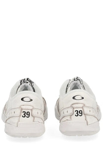 Back view of balenciaga women’s hamptons white sneakers with black branding textured leather and size 39 heel print