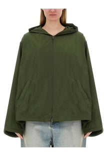 Balenciaga women’s olive green hooded zip-up jacket with two front pockets and relaxed oversized fit