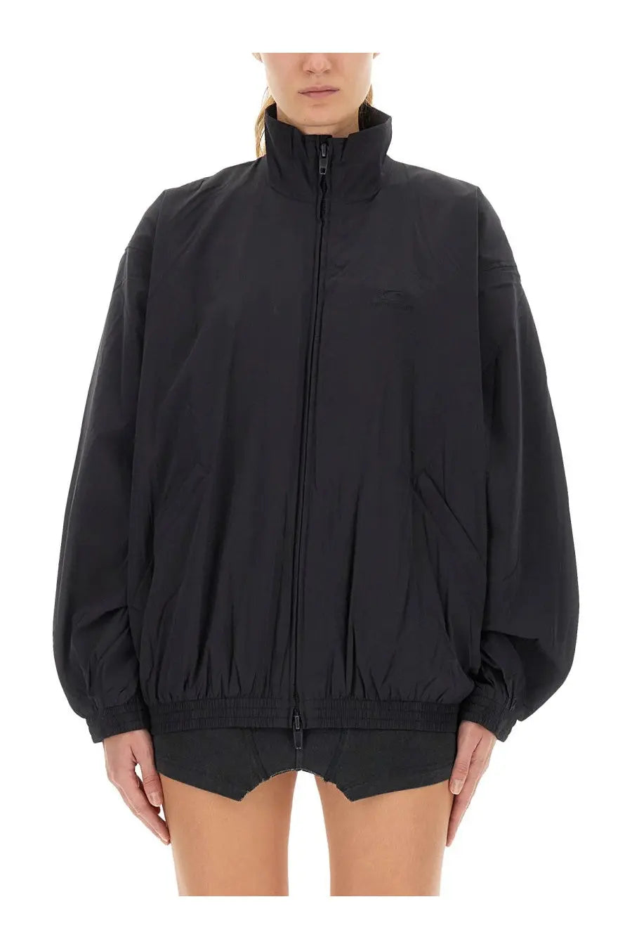 Balenciaga women’s black oversized zip-up jacket with high collar and elasticated cuffs made from durable fabric