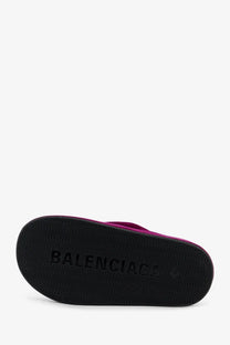 Black rubber sole with embossed balenciaga logo and wavy tread pattern on purple balenciaga women’s jet lag velvet sandals
