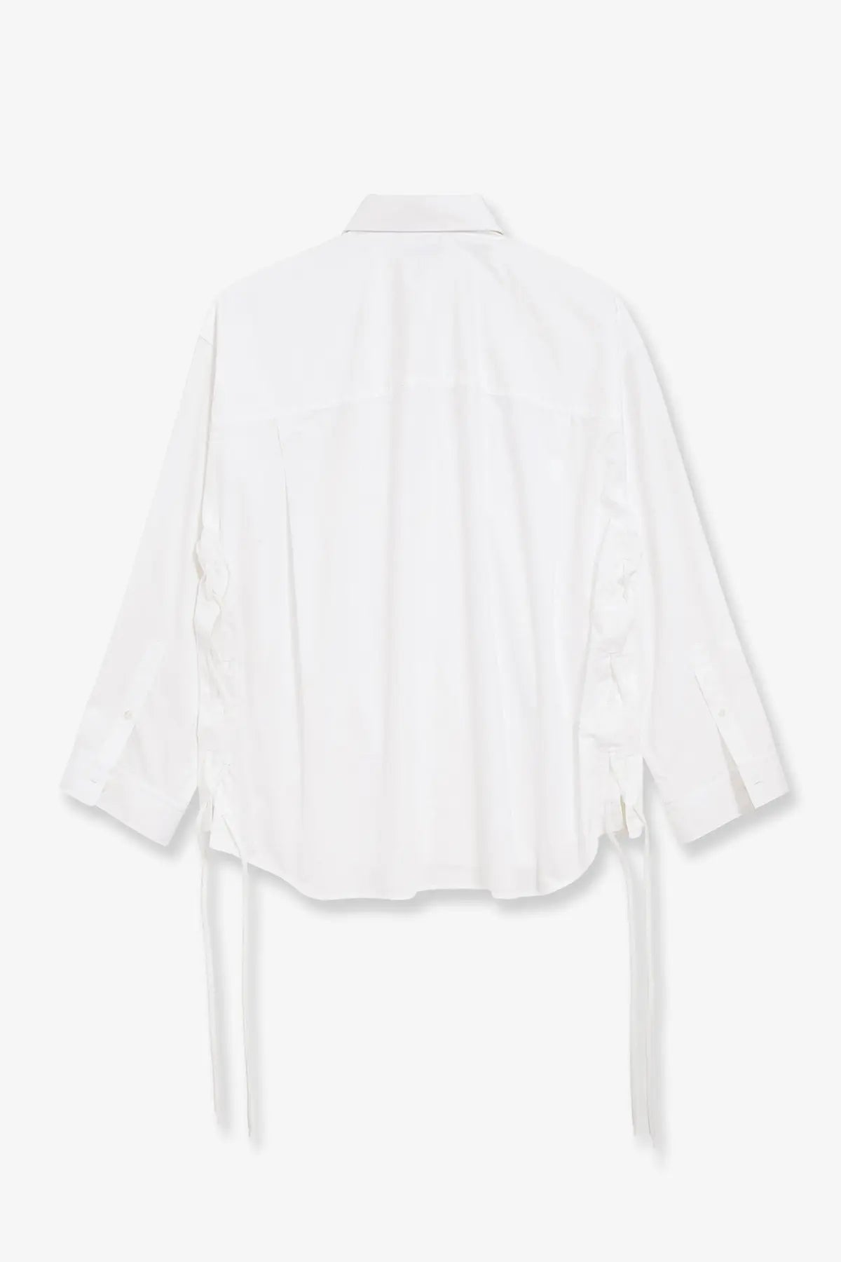 Balenciaga women’s white cotton blouse with ruffled sleeves and tie-back details shown from the back