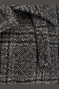 Balenciaga women’s black and white herringbone wool coat featuring one layer raglan sleeves