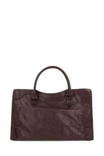 Balenciaga women’s le city bag medium in dark brown crinkled leather with rounded top handles and metallic hardware