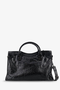 Balenciaga women’s le city medium leather handbag black with glossy cracked leather texture and structured design