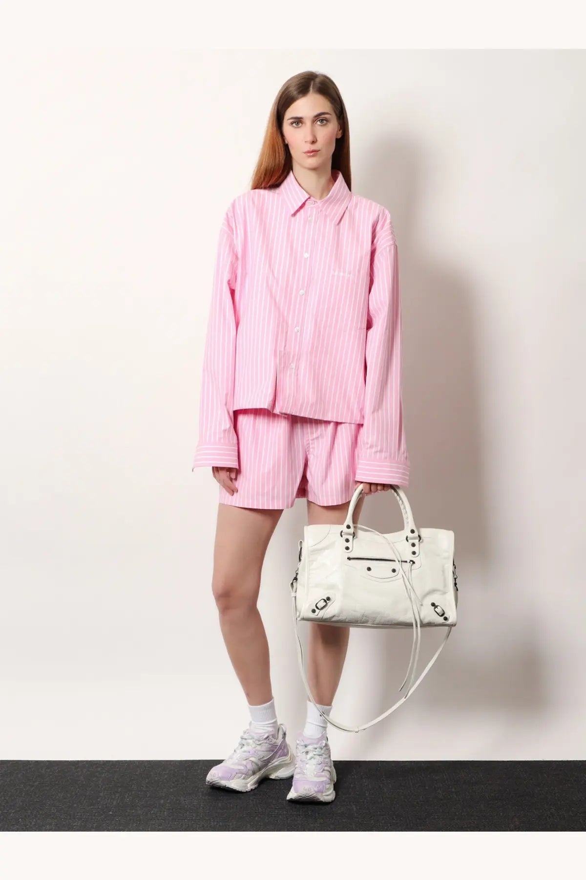 Balenciaga women’s le city medium white leather shoulder bag with black hardware and detachable shoulder strap