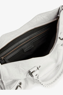 Balenciaga women’s le city medium leather shoulder bag in white crinkled leather with black interior and gold zippers