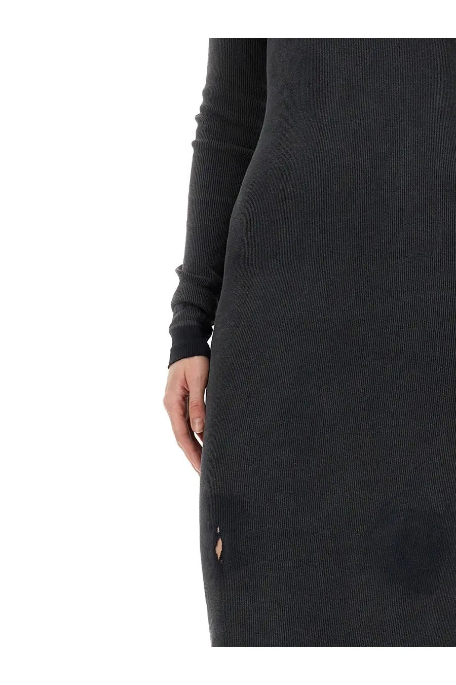 Balenciaga women’s long black ribbed knit dress with a small tear near the hem visible on the front side
