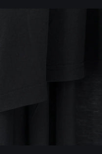 Balenciaga women’s long jersey shirt in black featuring subtle stitching detail on soft fabric