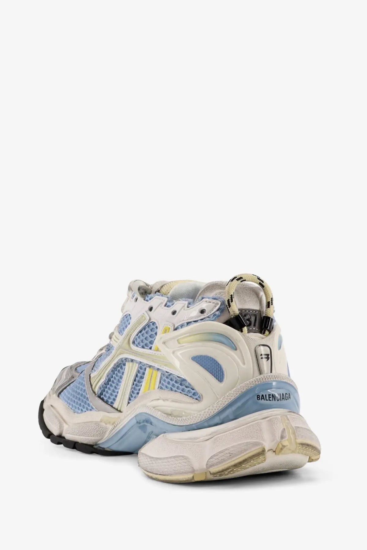 Balenciaga women’s low top runner mesh sneakers in light blue and white with rubber and translucent plastic details