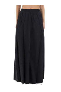 Balenciaga women’s black maxi skirt with elastic waistband and subtle pleats made from flowing fabric