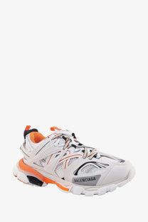 Balenciaga women’s mesh and nylon track sneaker in white with orange and black accents and triple s sole