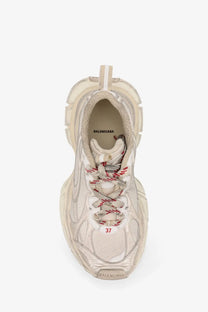 Balenciaga women’s beige mesh sneakers with cream-colored triple s chunky sole and red-accented laces