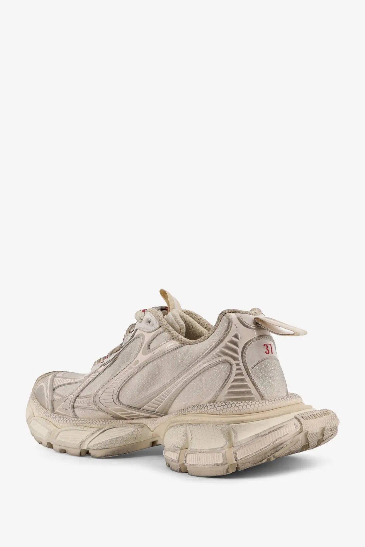 Balenciaga women’s beige mesh sneakers with textured upper and chunky rubber sole triple s design