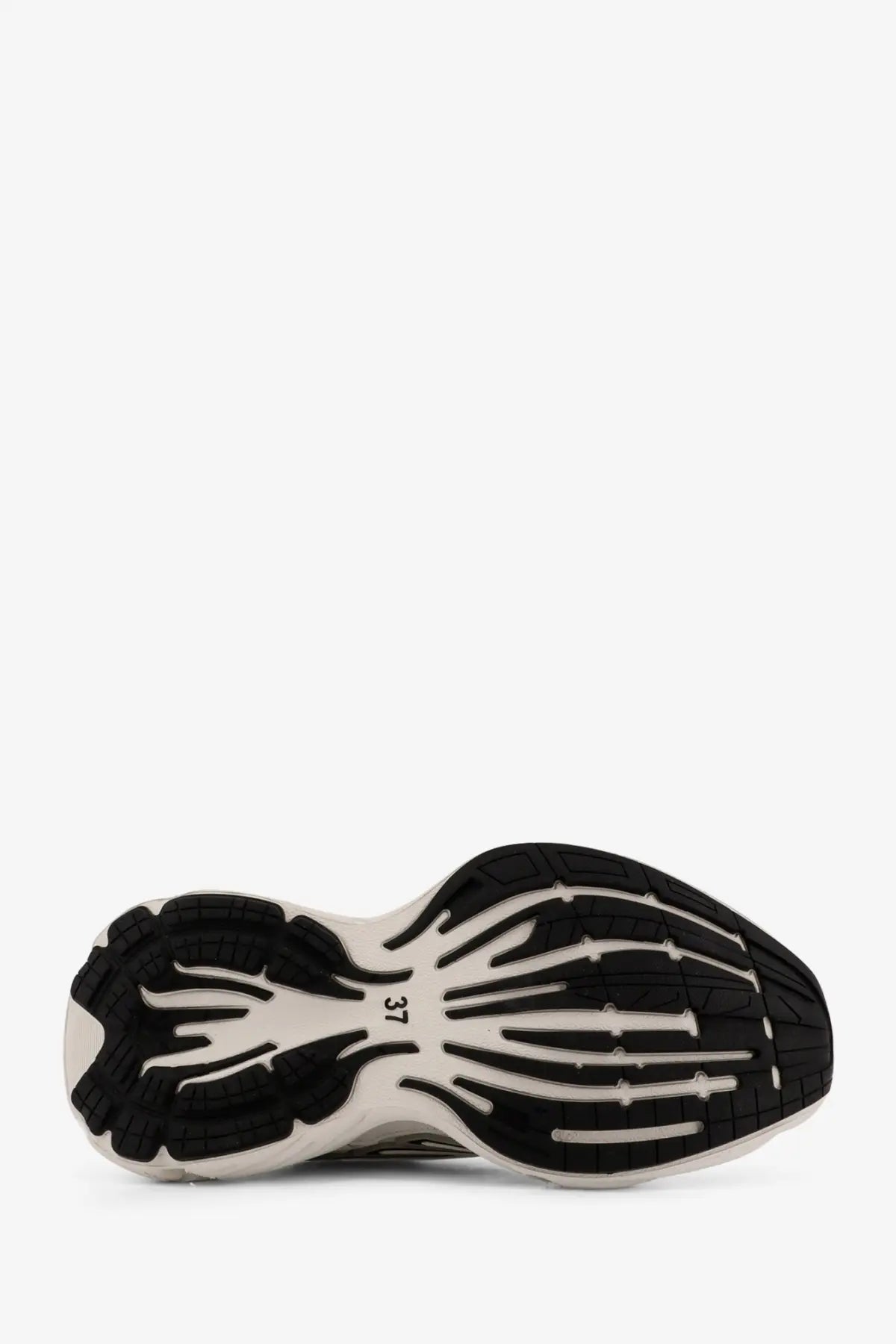 Black and white textured sole of balenciaga women’s monday low top leather sneakers in white