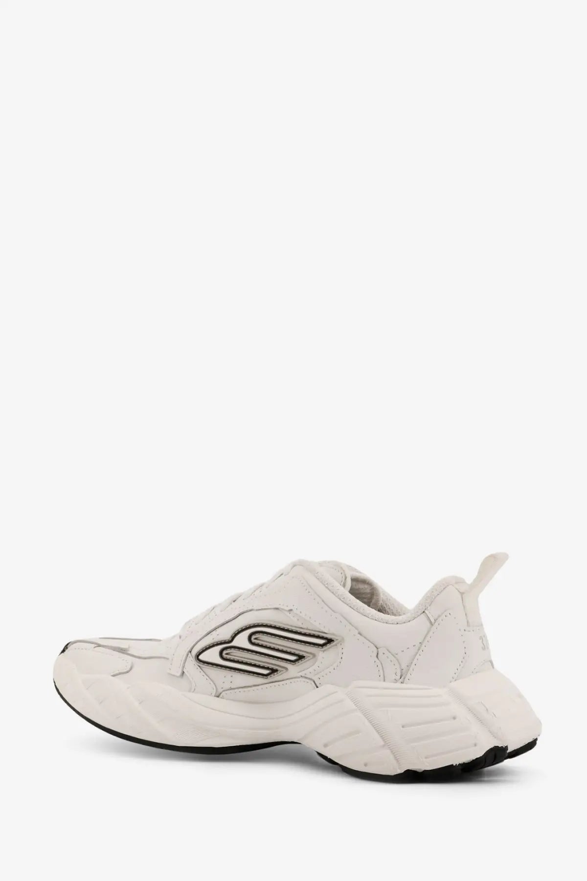 Balenciaga women’s monday low top leather sneakers in white featuring a chunky sole and black skechers logo detailing