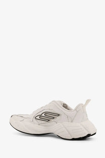Balenciaga women’s monday low top leather sneakers in white featuring a chunky sole and black skechers logo detailing