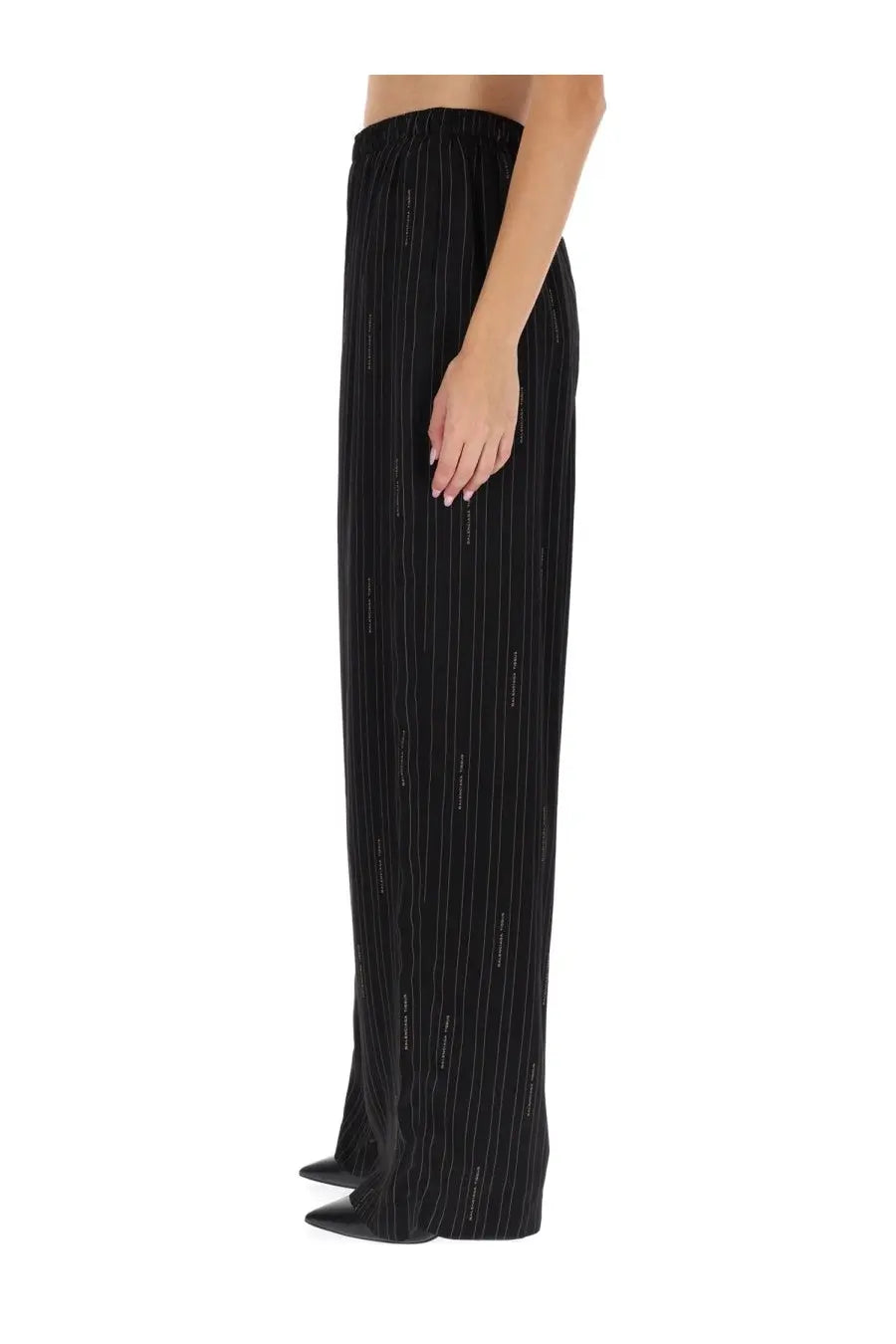 Balenciaga women’s black pyjama pants with wide-leg cut subtle vertical pinstripes and gathered waistband