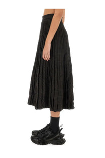 Balenciaga women’s pleated skirt brown with a subtle textured pattern in black midi length