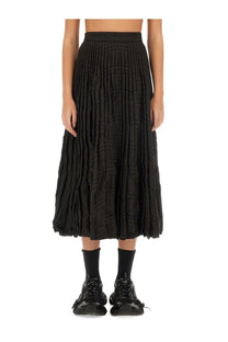 Balenciaga women’s pleated midi skirt in black woven fabric with high-waisted design and textured finish