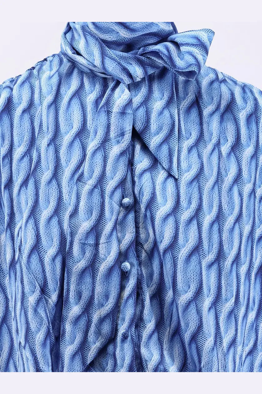 Balenciaga women’s long blue printed fabric dress with textured cable knit blouse and matching tied neck scarf