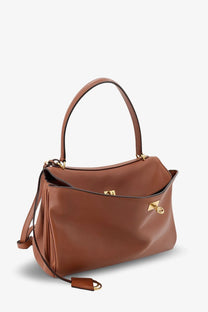 Balenciaga women’s rodeo beige leather crossbody bag with brown leather, gold-tone hardware, and detachable strap