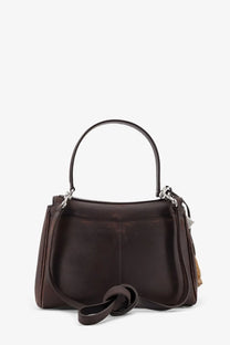 Balenciaga women’s rodeo leather crossbody bag in dark brown with curved top handle and detachable shoulder strap