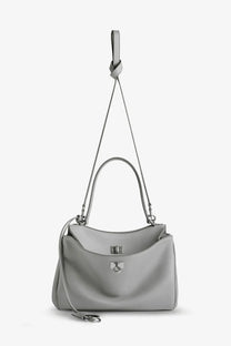 Balenciaga women’s rodeo leather crossbody bag in light gray with a sleek silhouette and silver-toned hardware accents