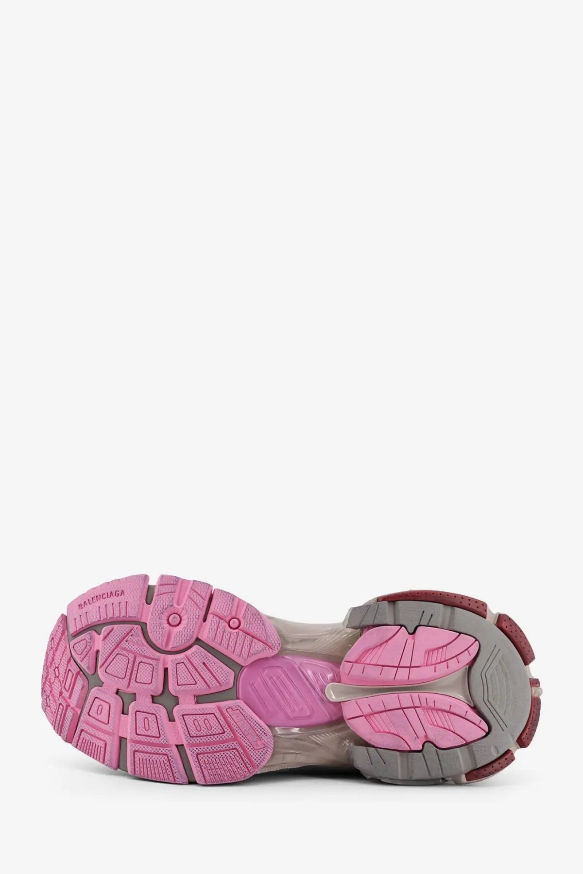 Pink and gray rubber sole of balenciaga women’s runner nylon low top sneakers beige shown from the back side