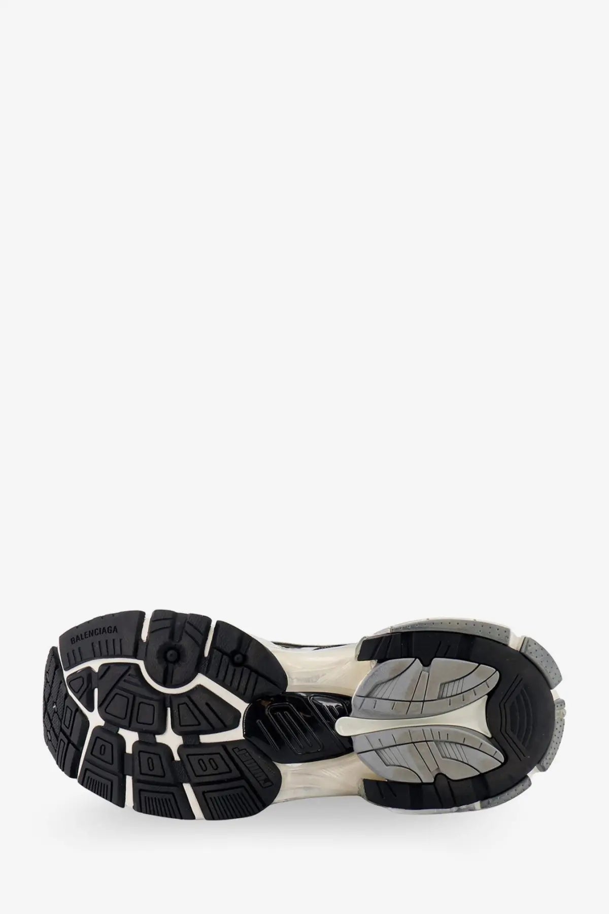 Balenciaga women’s runner nylon sneakers in black featuring a gray chunky sole with layered rubber design