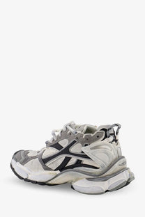 Balenciaga women’s runner nylon sneakers in black with chunky sole and layered white gray and black materials
