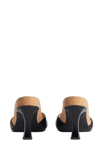 Balenciaga women’s sandal scholl black leather mules with cork insole and sleek modern heel shown from the back