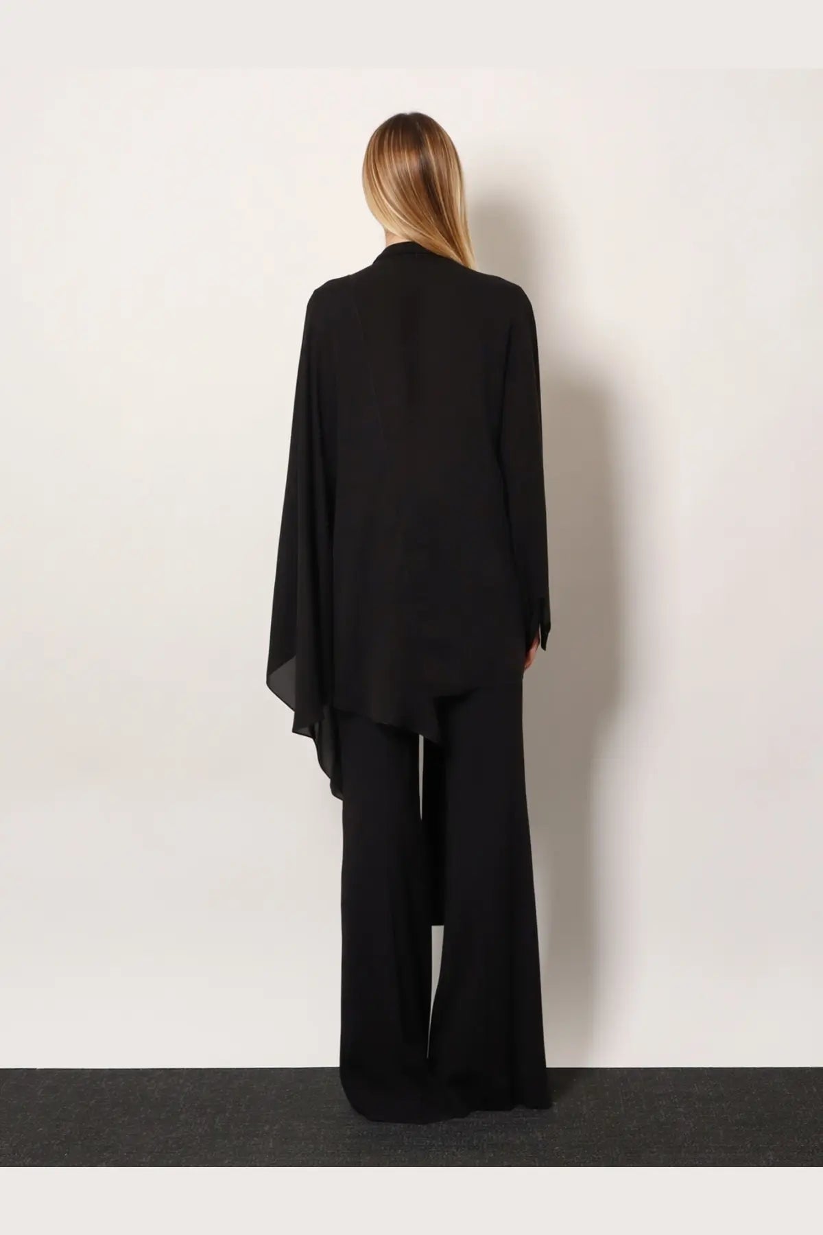 Balenciaga women’s black silk shirt featuring a flowing chiffon blazer with asymmetrical hem and wide sleeves
