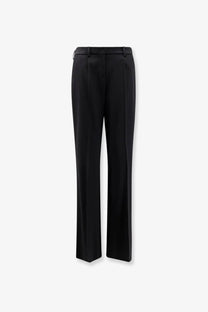 Balenciaga women’s slim tailored wool trousers in black with sleek straight-leg cut and subtle front pleats