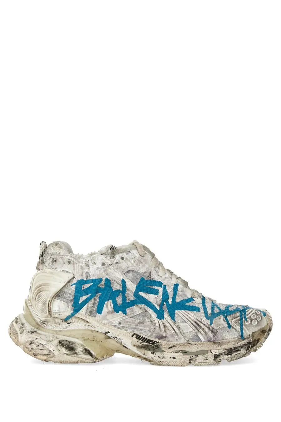 Balenciaga women’s distressed white sneaker with bold blue graffiti lettering and chunky textured sole