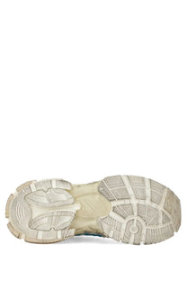 The balenciaga women’s sneaker runner white features a chunky off-white rubber sole with intricate tread and visible stitching