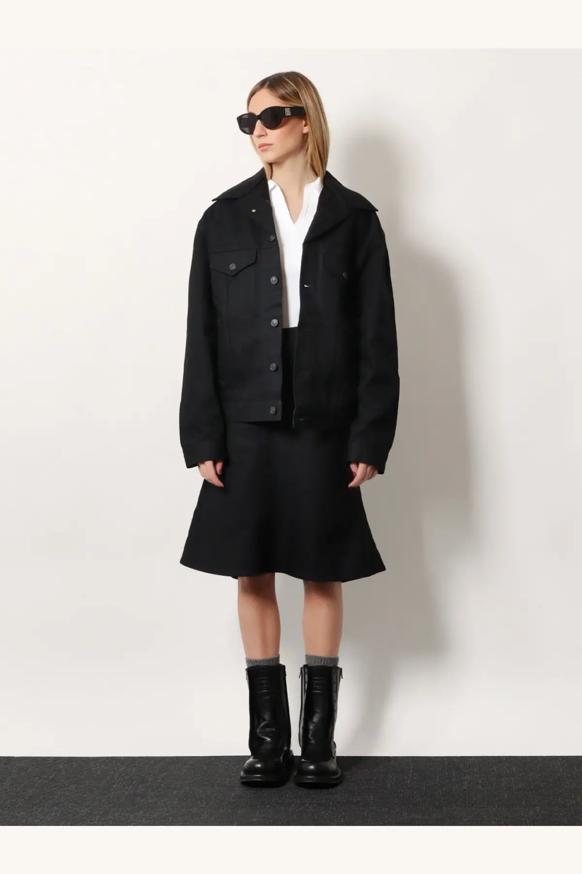 Balenciaga women’s black wool blend jacket with buttoned front and flap pockets for stylish warmth