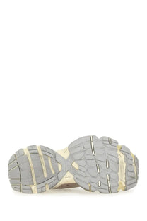 Beige and gray chunky sole with textured tread of balenciaga women’s stapler sneaker viewed from the back side