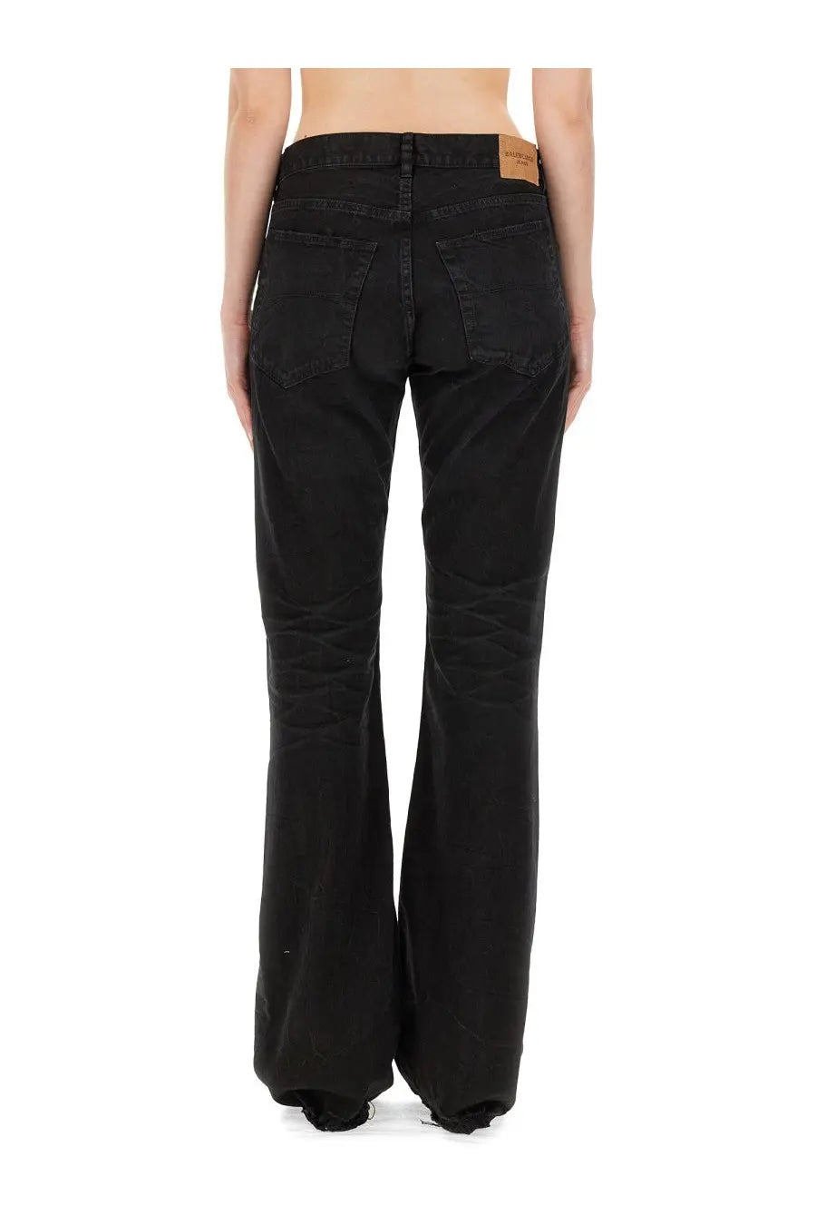 Balenciaga women’s black straight pants in wide-leg denim with faded wash and frayed hems