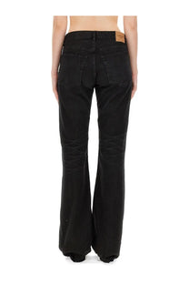 Balenciaga women’s black straight pants in wide-leg denim with faded wash and frayed hems