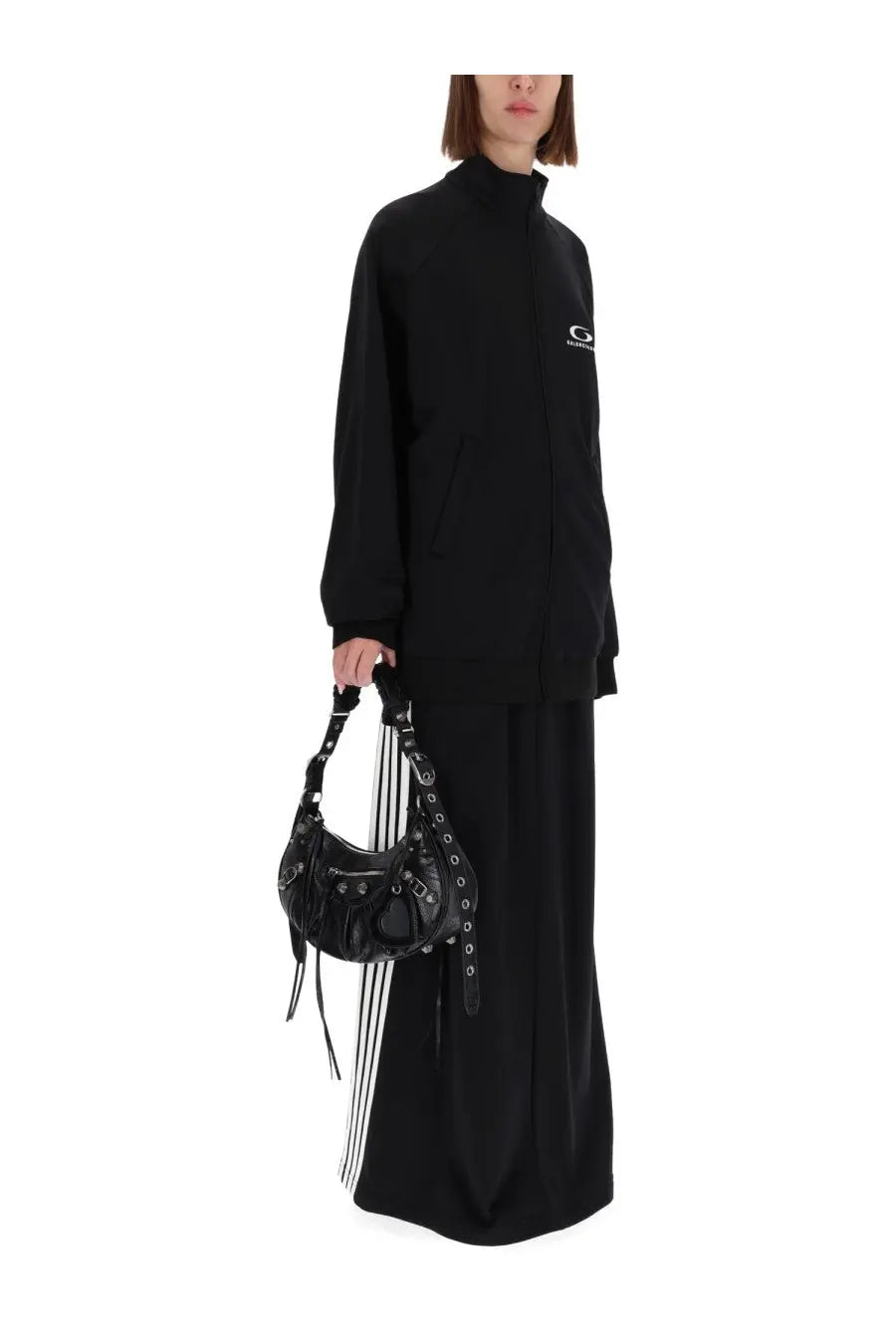 Black leather balenciaga speedy bag with silver hardware and fringed straps featured with balenciaga women’s sweatshirt black