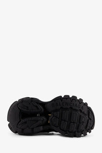 Black rubber sole of balenciaga women’s track mesh sneakers with bold chunky tread and embossed brand logo