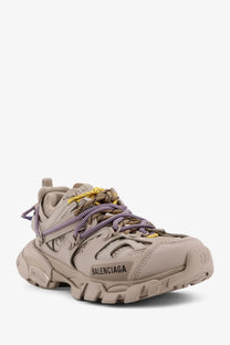 Beige balenciaga women’s track mesh sneaker with purple and yellow laces in multicolor design