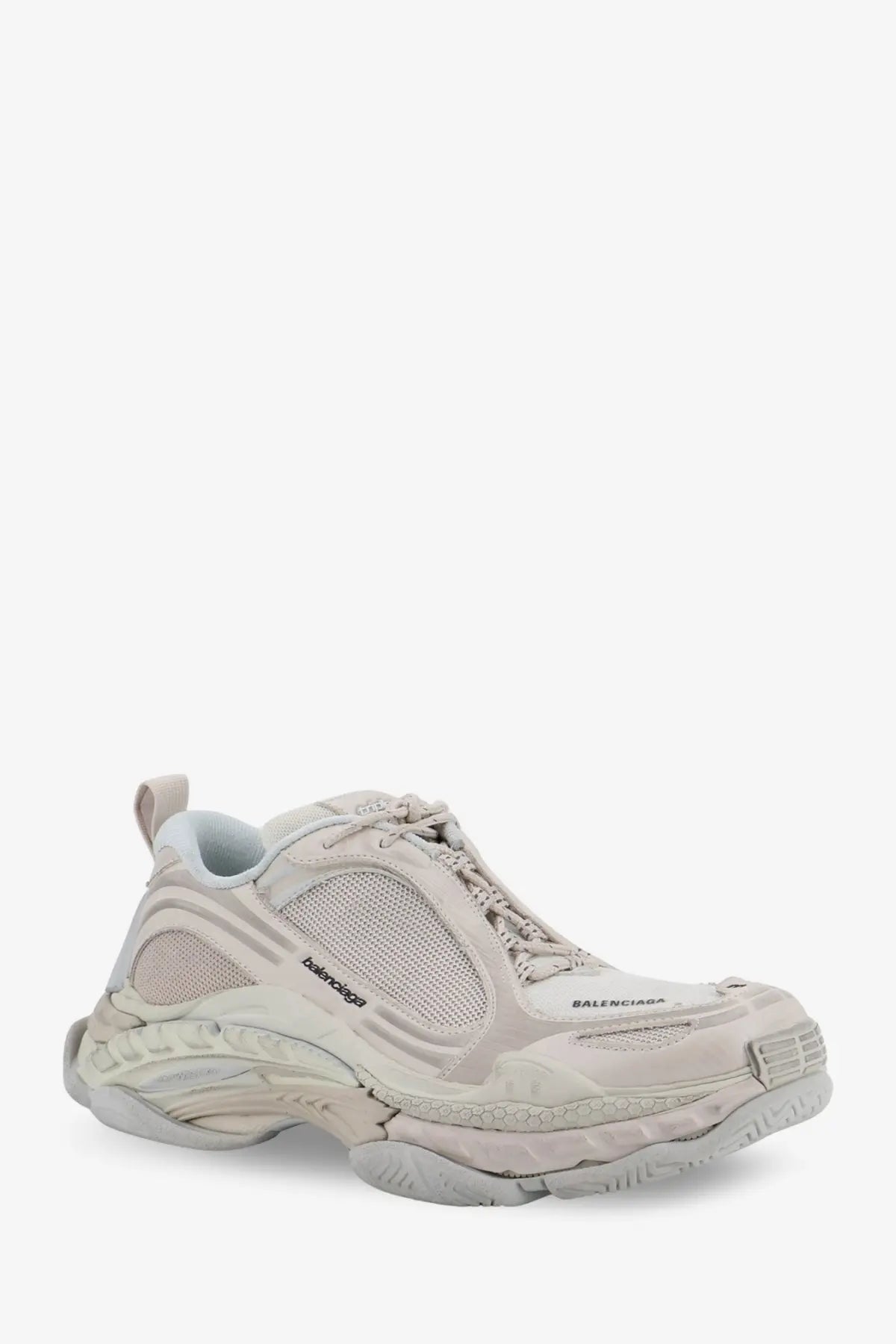 Beige balenciaga women’s triple s2 sneaker with chunky layered sole and mesh and nylon inserts in white
